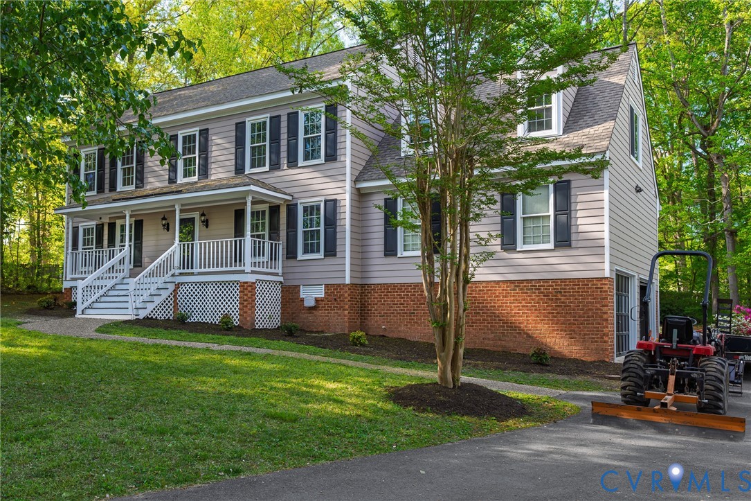 4502 Greyfield Place Chester, VA 23831 - Photo 5 of 40 a view of a house with a swimming pool