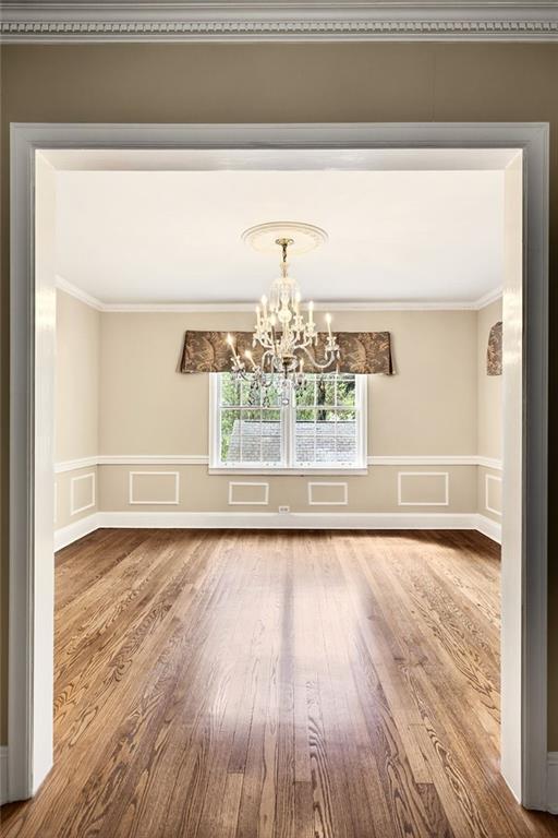 596 West Wesley Road Northwest Atlanta, GA 30305 - Photo 13 of 60 a view of a living room with wooden floor