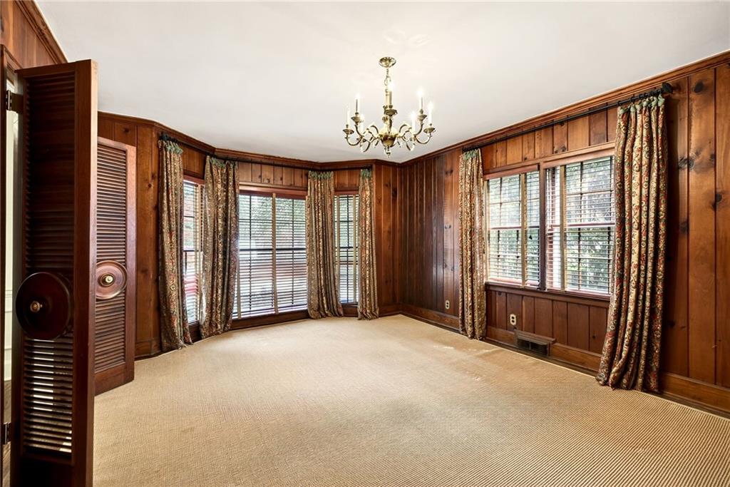 596 West Wesley Road Northwest Atlanta, GA 30305 - Photo 23 of 60 a view of an empty room with a window