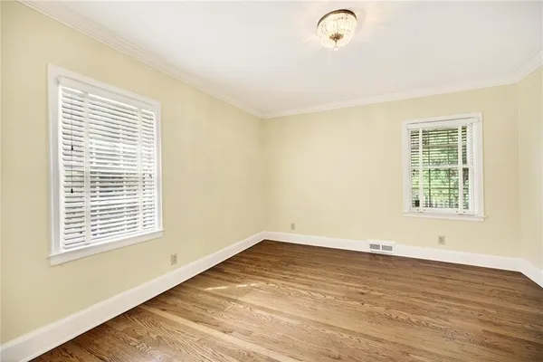 a view of a porch with wooden floor and outdoor space