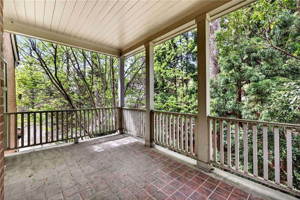 596 West Wesley Road Northwest Atlanta, GA 30305 - Photo 37 of 60 a view of a porch with wooden floor and outdoor space