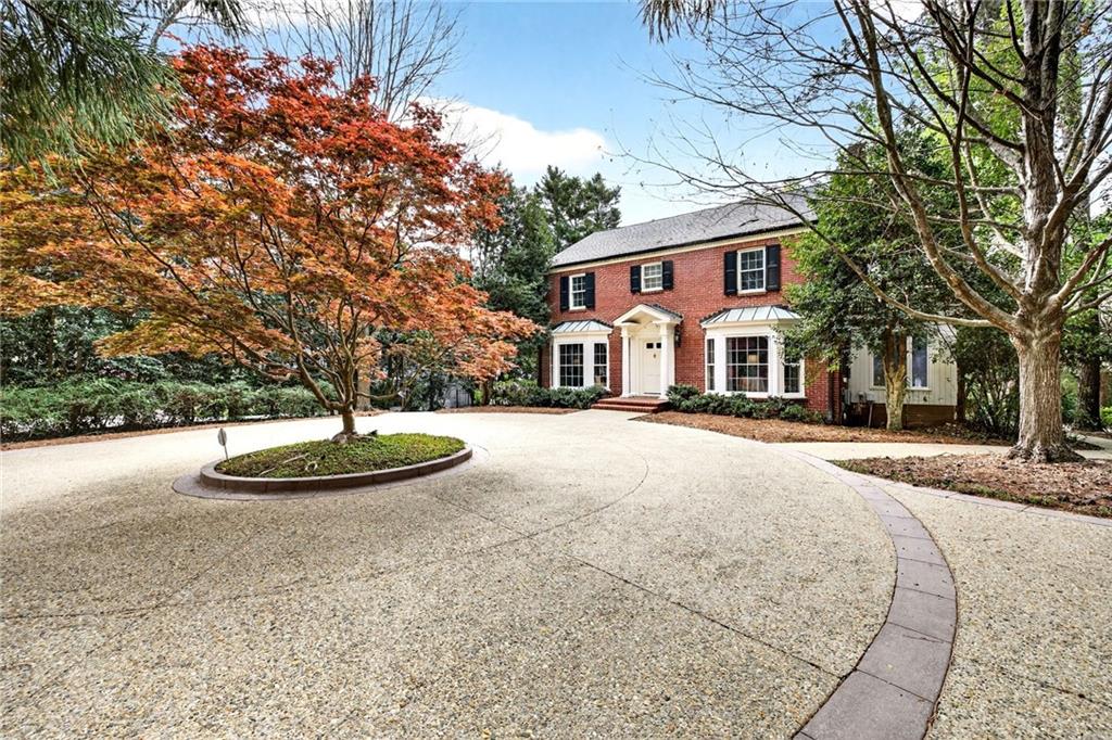 596 West Wesley Road Northwest Atlanta, GA 30305 - Photo 58 of 60 a view of a white house with a sink and yard