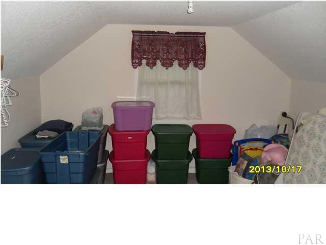 31773 Narrow Road Seminole, AL 36574 - Photo 19 of 25 LARGE FINSHED STORAGE OFF THE 3RD BEDROOM