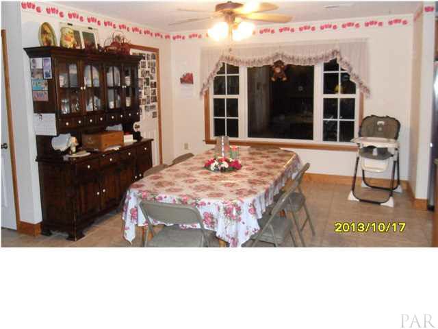 31773 Narrow Road Seminole, AL 36574 - Photo 9 of 25 DINNING ROOM NEXT TO KITCHEN