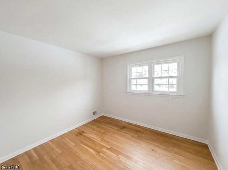 78 Parkside Road Plainfield, NJ 07060 - Photo 11 of 29 an empty room with a window
