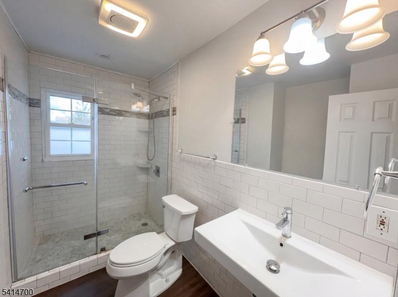 78 Parkside Road Plainfield, NJ 07060 - Photo 23 of 29 a bathroom with a sink toilet and shower