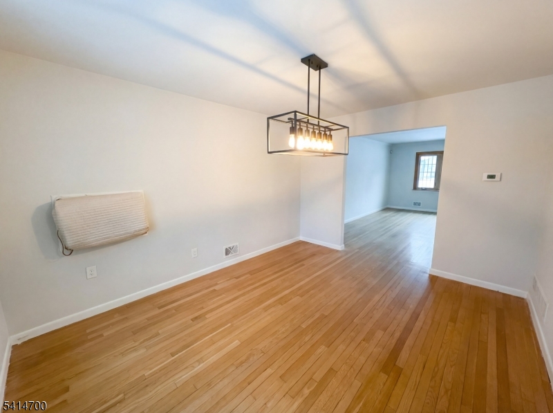 78 Parkside Road Plainfield, NJ 07060 - Photo 8 of 29 a view of empty room with wooden floor