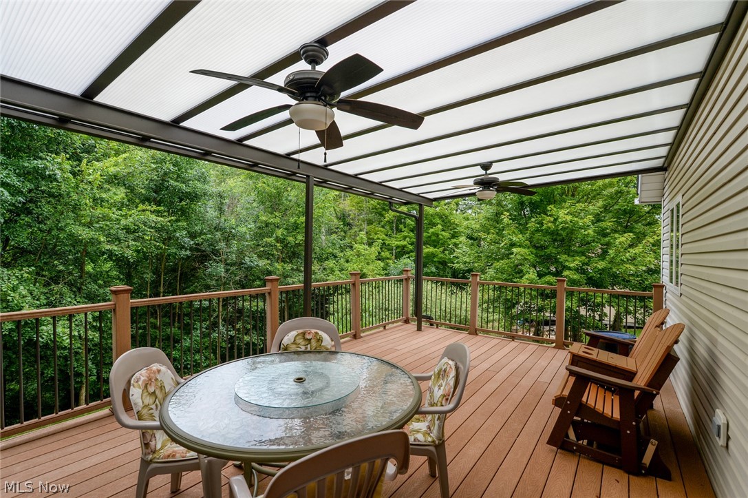 4490 Fenn Road Medina, OH 44256 - Photo 30 of 35 The breakfast area exits to a 22 X 14 covered, elevated, composite deck. Fabulous views of the woods, which is Medina County Park District land.