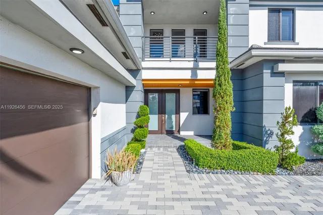 a view of swimming pool with a table and chairs