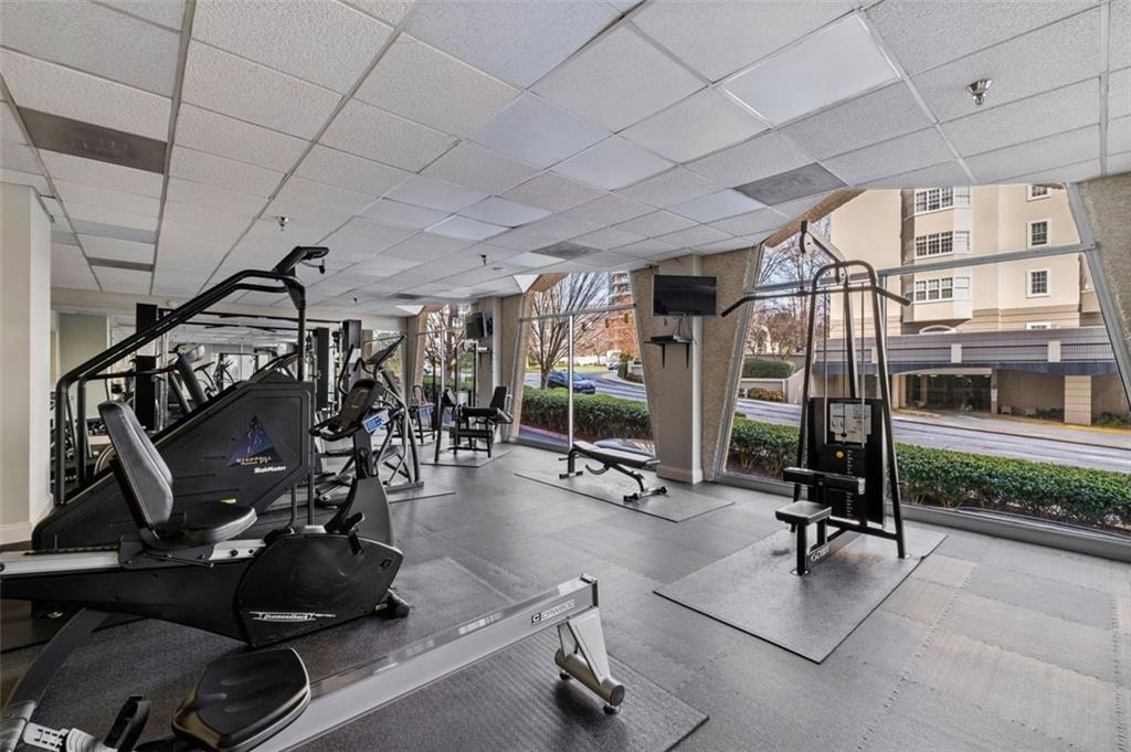 2479 Peachtree Street Northeast, Unit 912 Atlanta, GA 30305 - Photo 26 of 36 a view of a room with gym equipment