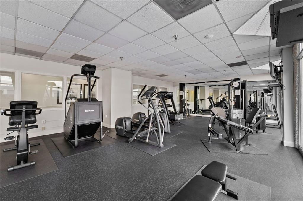 2479 Peachtree Street Northeast, Unit 912 Atlanta, GA 30305 - Photo 27 of 36 a view of a room with gym equipment
