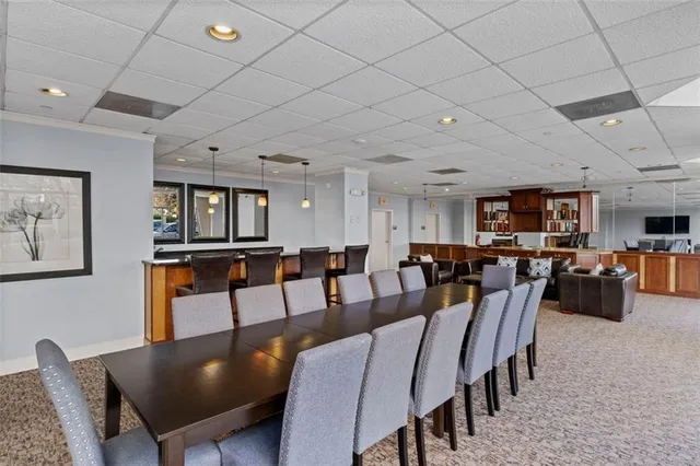 a view of a dining room with furniture