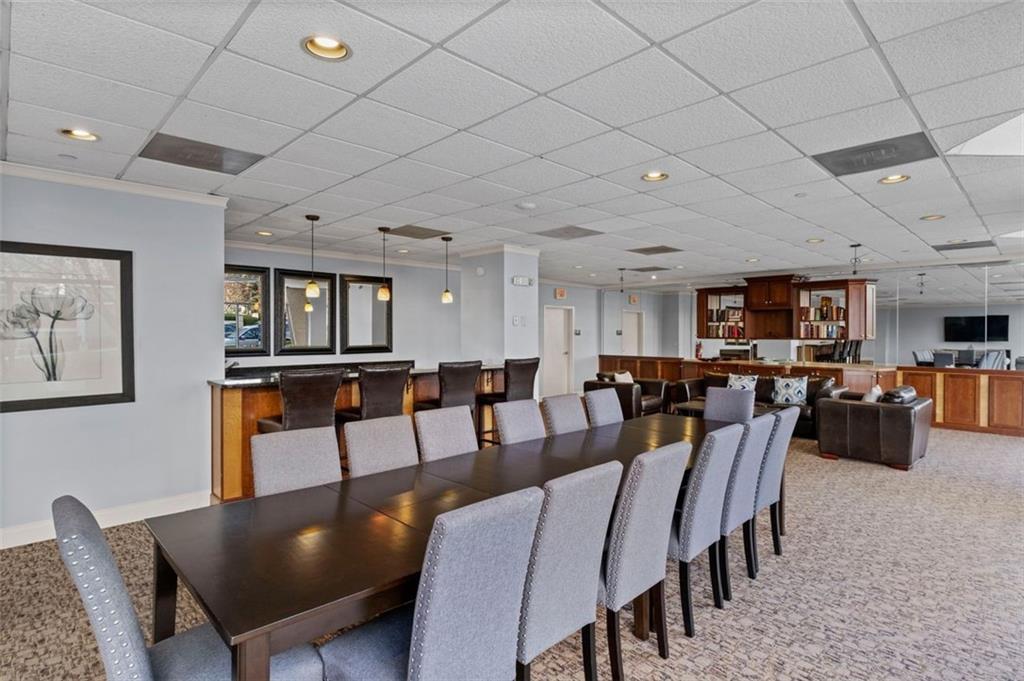 2479 Peachtree Street Northeast, Unit 912 Atlanta, GA 30305 - Photo 30 of 36 a view of a dining room with furniture