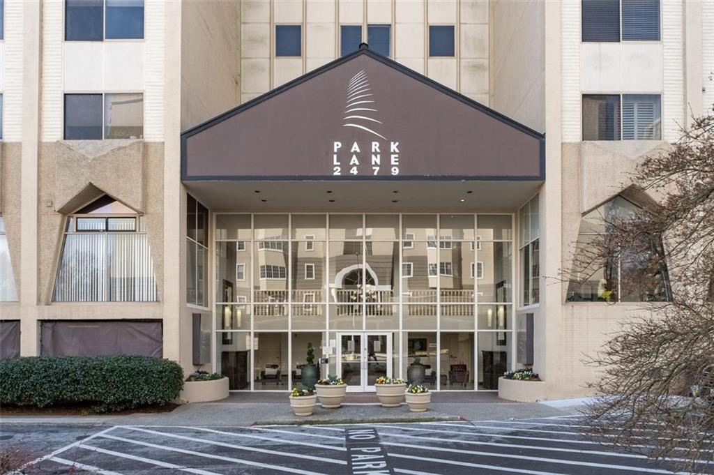 2479 Peachtree Street Northeast, Unit 912 Atlanta, GA 30305 - Photo 5 of 36 a front view of a building with a entryway