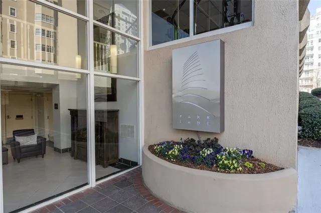 a view of a potted flower in a corridor