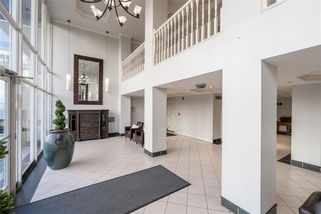2479 Peachtree Street Northeast, Unit 912 Atlanta, GA 30305 - Photo 7 of 36 a view of a livingroom with furniture and staircase