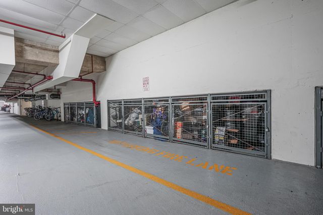 a view of water heater room with stairs