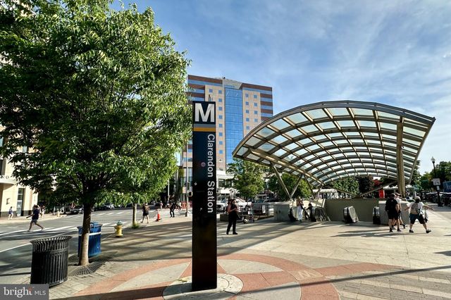a view of a patio with swimming pool table and chairs