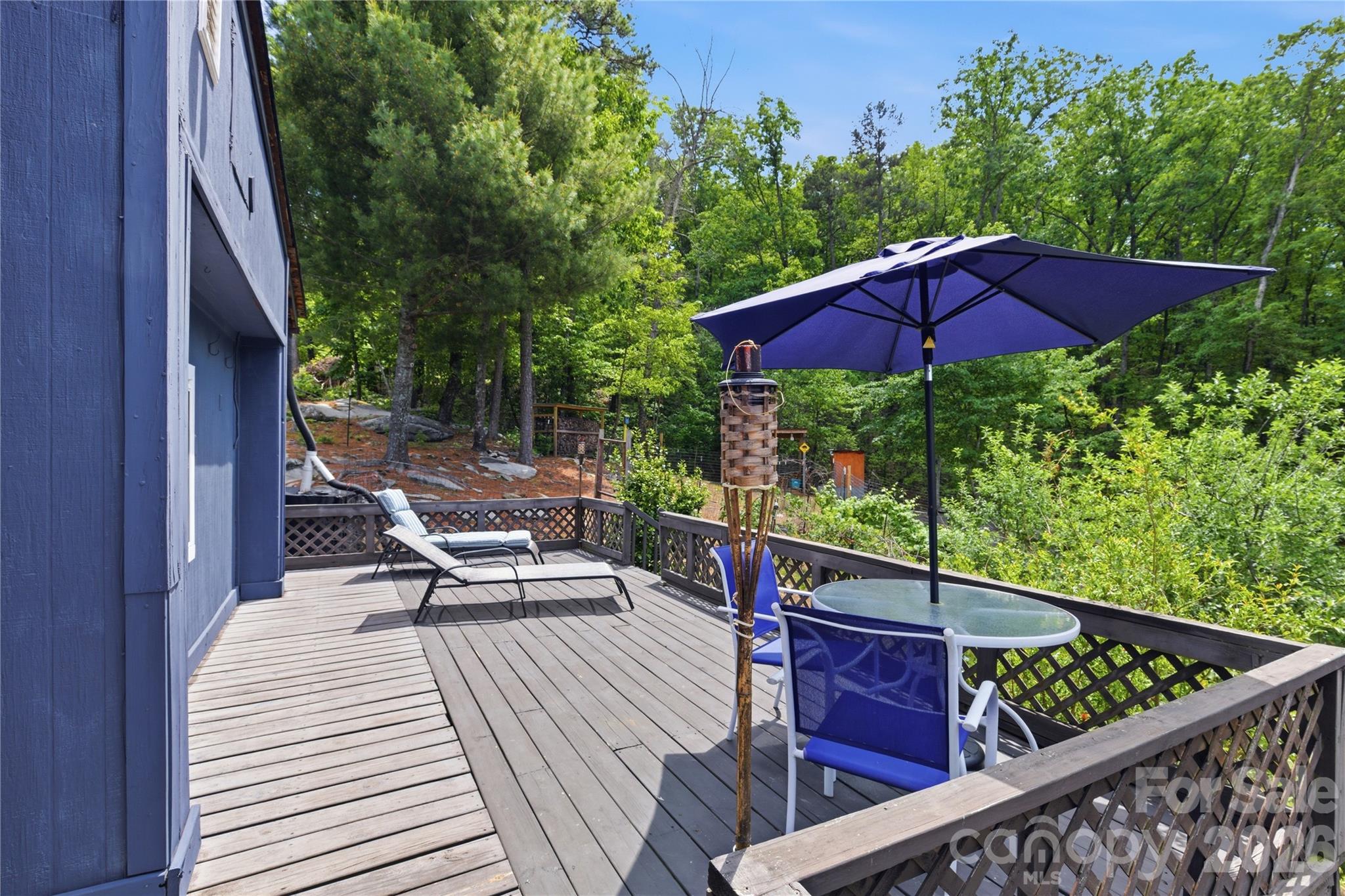 159 Volley Ellenboro, NC 28040 - Photo 13 of 37 a view of a patio with chairs and wooden floor