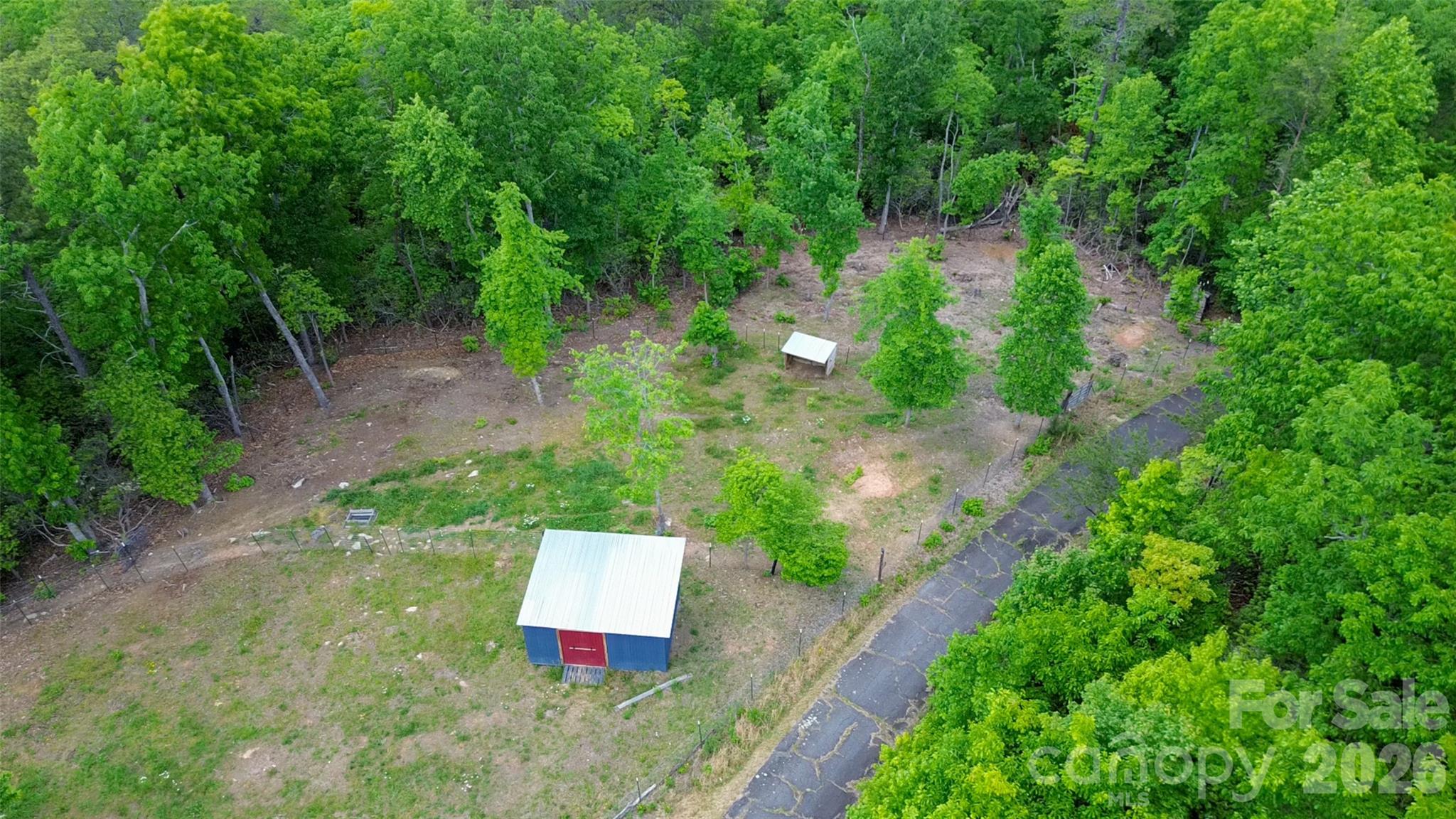 159 Volley Ellenboro, NC 28040 - Photo 26 of 37 an aerial view of a house with a yard