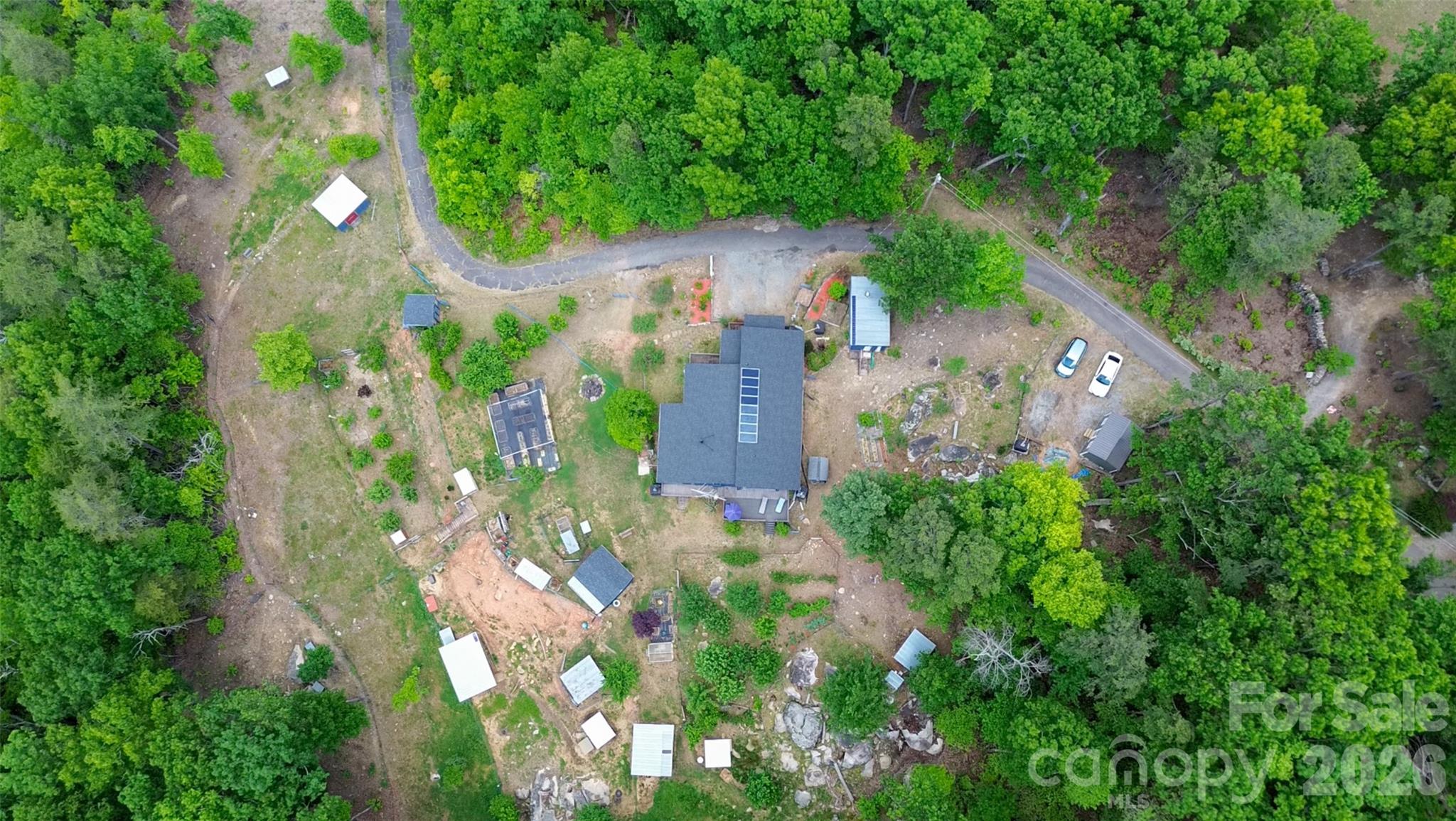 159 Volley Ellenboro, NC 28040 - Photo 28 of 37 an aerial view of a house with yard
