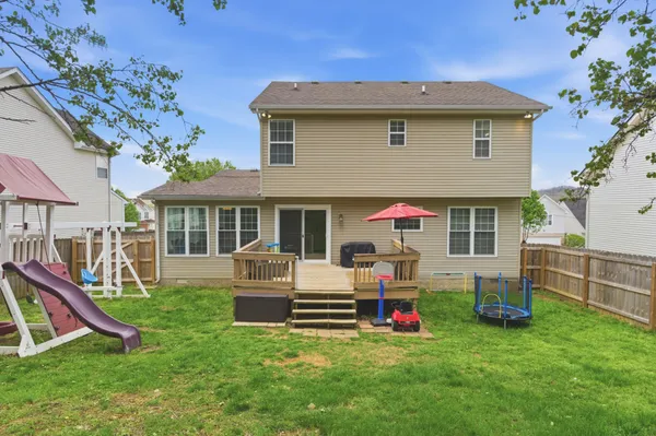 a front view of house with yard and entertaining space