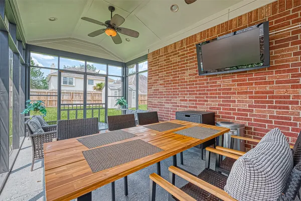 a view of a dining room with furniture window and outside view