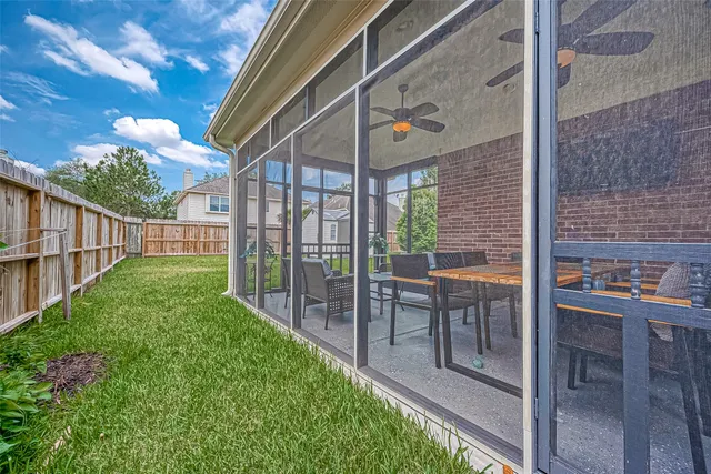 a view of a porch with a backyard