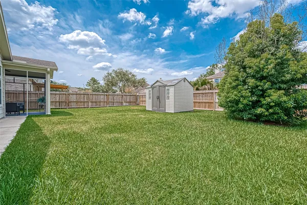 a view of a backyard with a garden