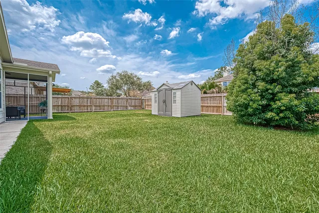 a view of a backyard with a garden