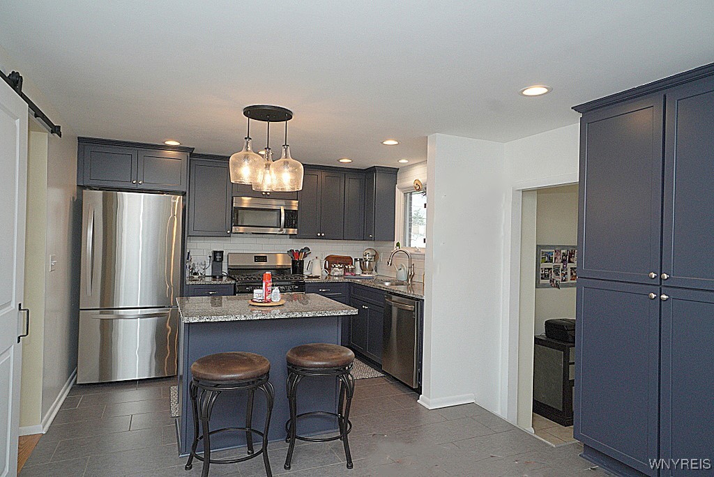 15 Schaefer Road West Seneca, NY 14224 - Photo 17 of 48 note the large pantry to the right in the kitchen