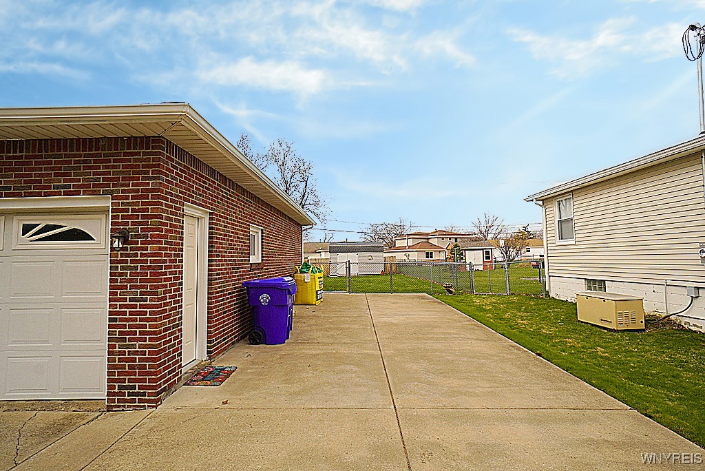 15 Schaefer Road West Seneca, NY 14224 - Photo 3 of 48 Concrete side parking pad next to the garage all t