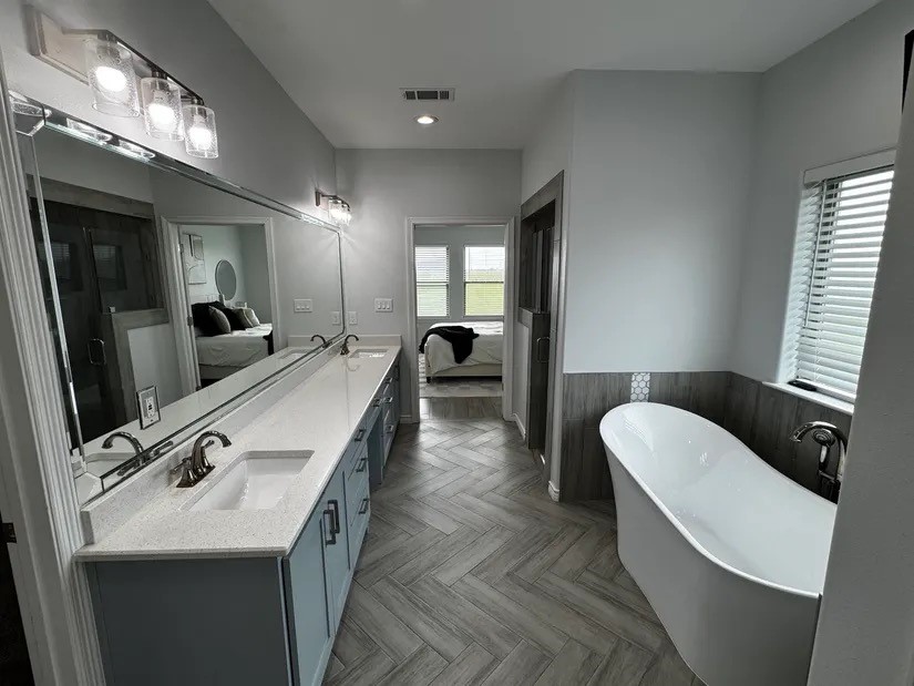 2295 Diamond D Lane Beaumont, TX 77713 - Photo 13 of 40 a en suite spacious bathroom with a double vanity sink and a mirror