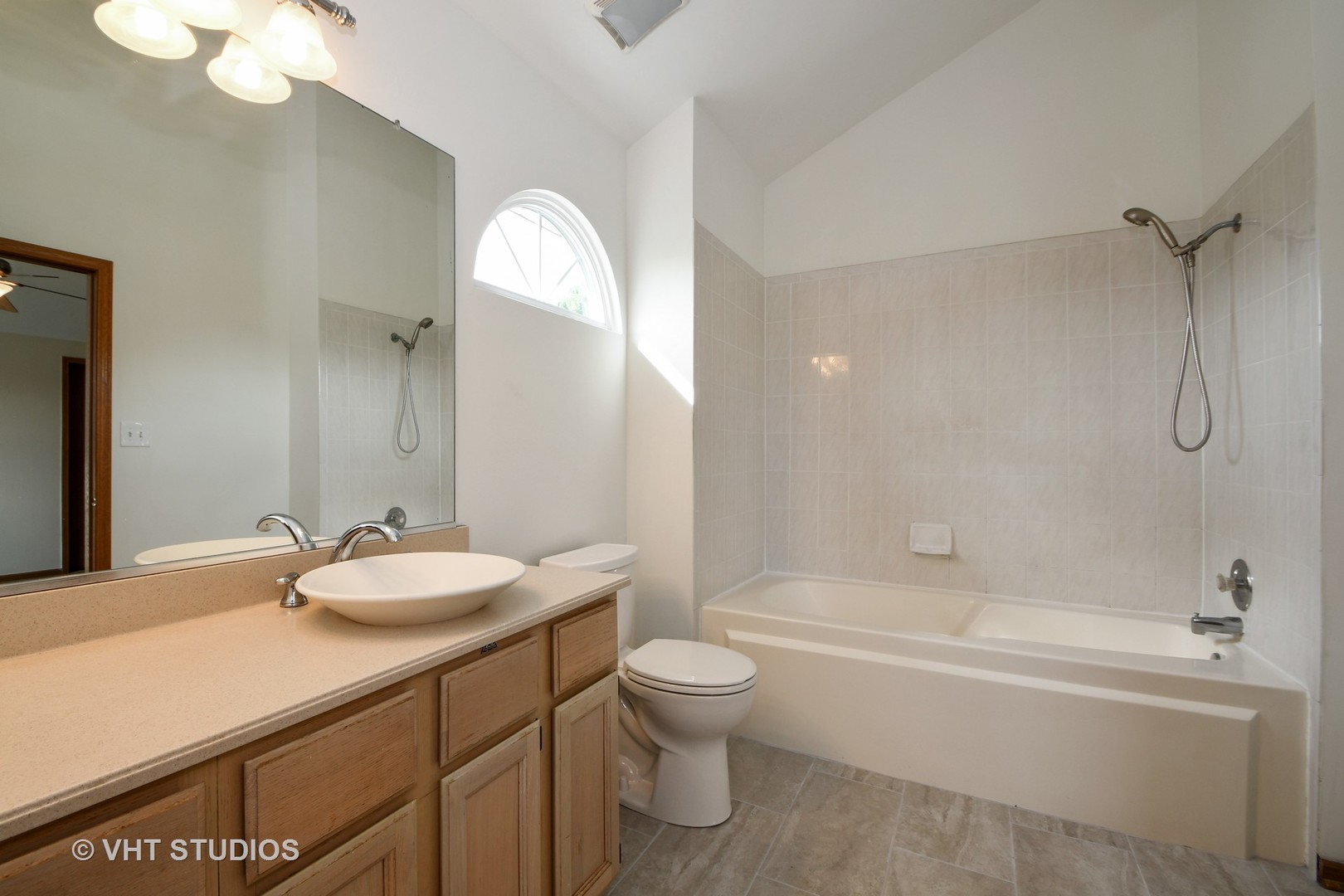 8116 Old Mill Road Frankfort, IL 60423 - Photo 10 of 16 a bathroom with a granite countertop sink toilet and shower