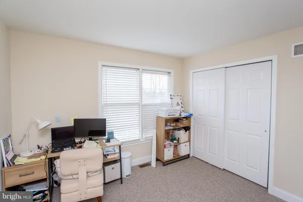 a room with toys and a book shelf