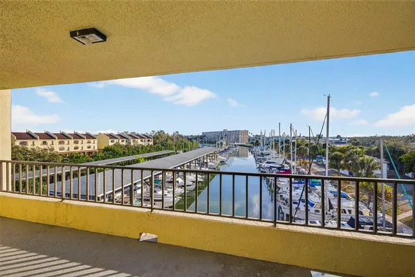 a view of a balcony with city view
