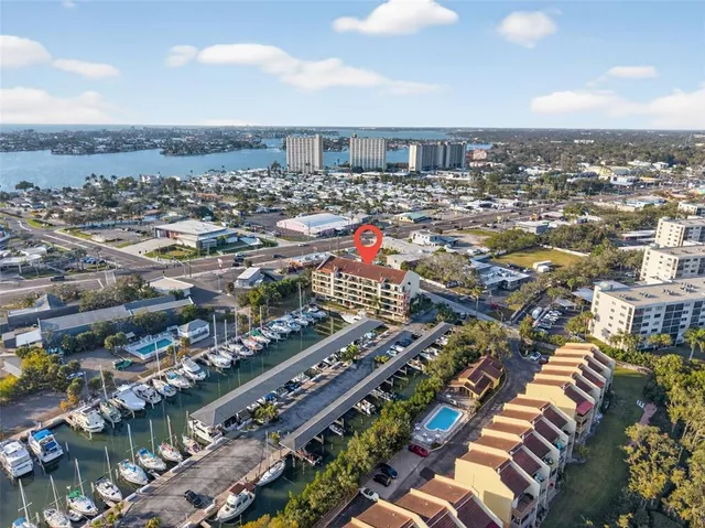 an aerial view of a city with ocean view