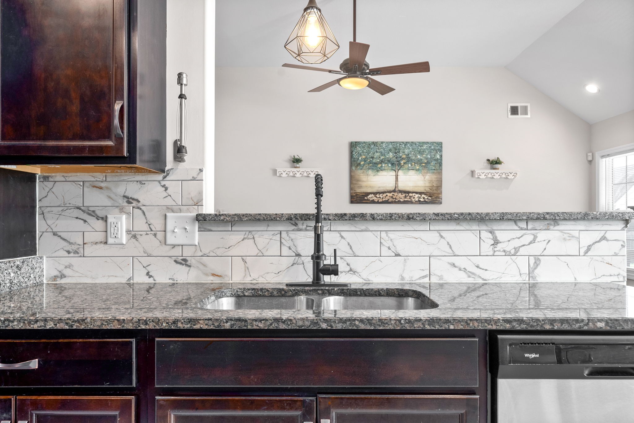 1478 Raven Road Clarksville, TN 37042 - Photo 12 of 42 a kitchen with granite countertop a sink and a granite counter tops
