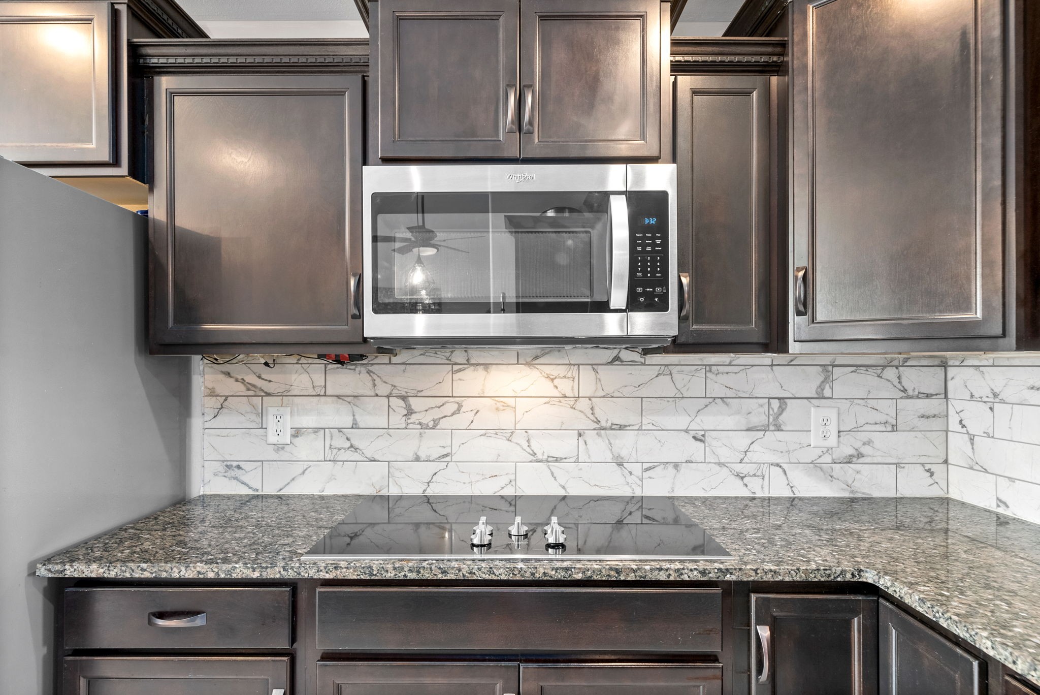 1478 Raven Road Clarksville, TN 37042 - Photo 13 of 42 a kitchen with granite countertop white cabinets and stainless steel appliances