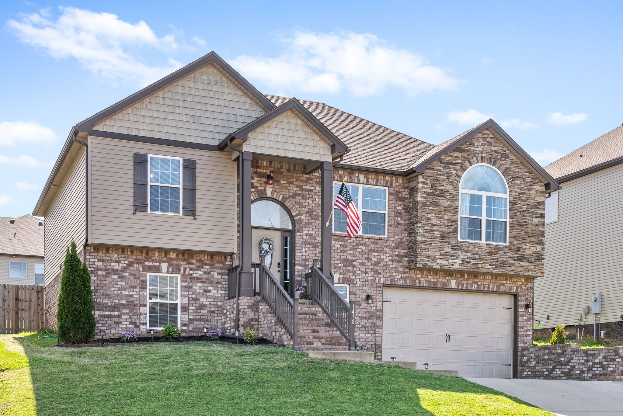 1478 Raven Road Clarksville, TN 37042 - Photo 2 of 42 a front view of a house with garden