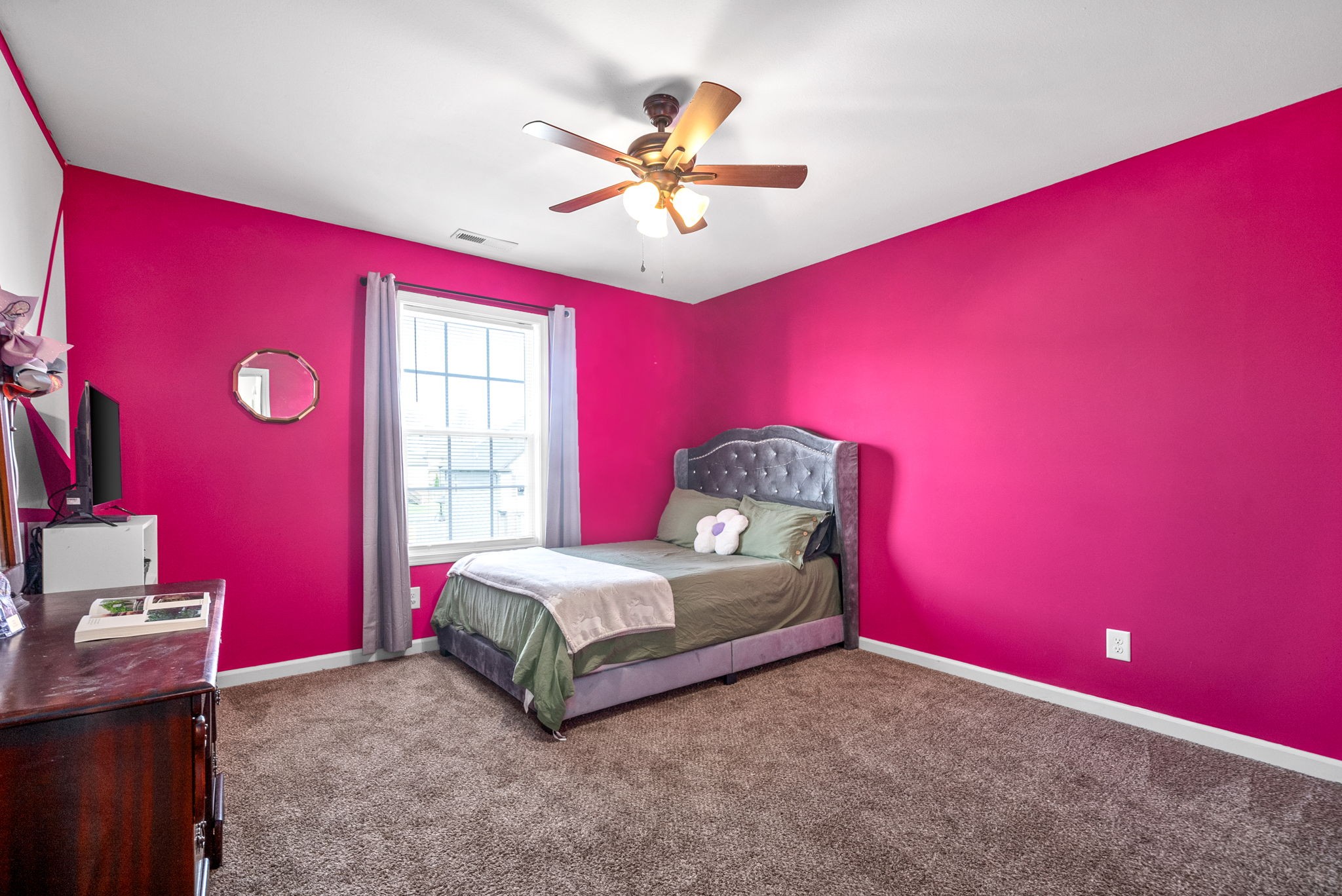 1478 Raven Road Clarksville, TN 37042 - Photo 24 of 42 a spacious bedroom with a bed and a window