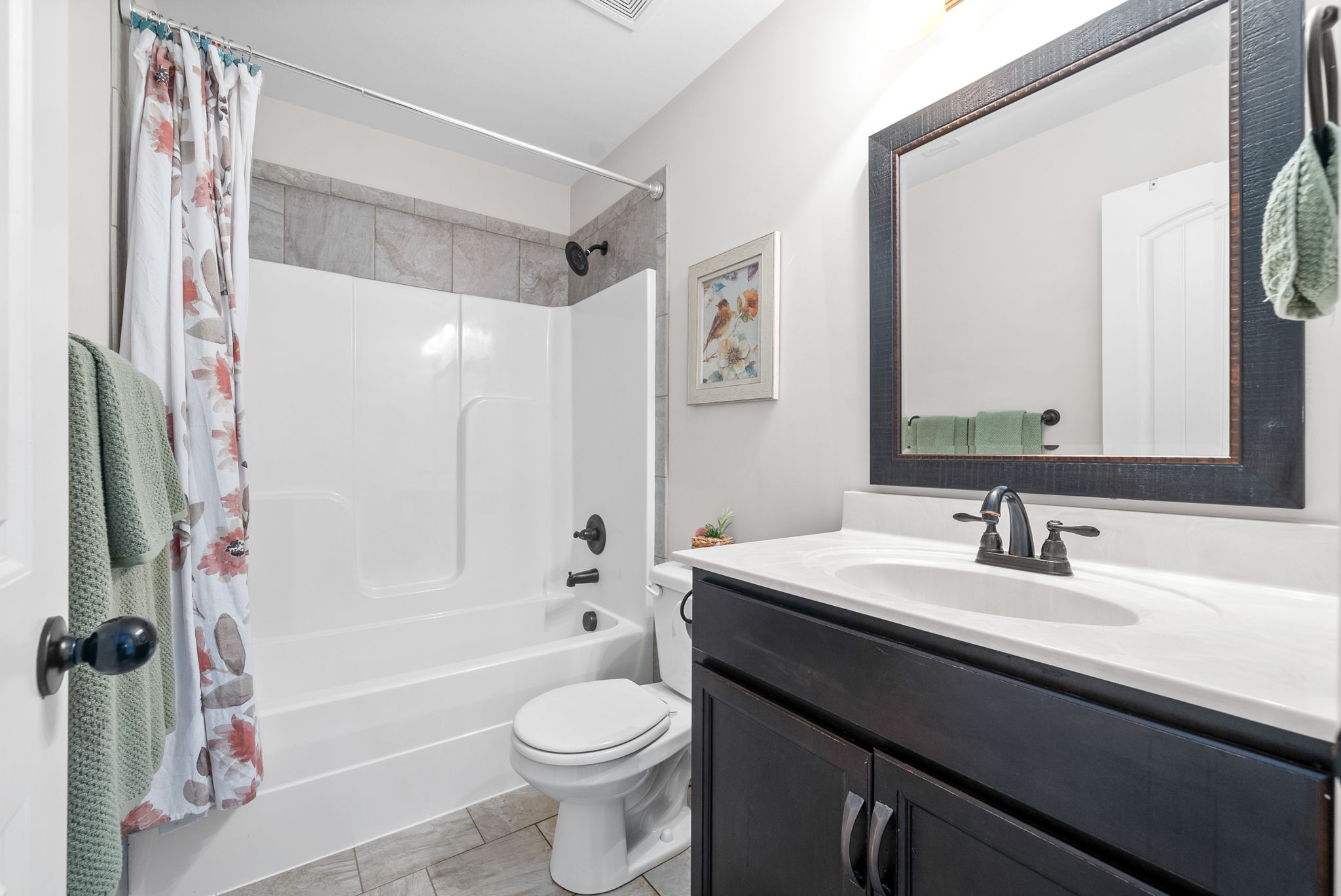 1478 Raven Road Clarksville, TN 37042 - Photo 26 of 42 a bathroom with a sink a toilet and a mirror