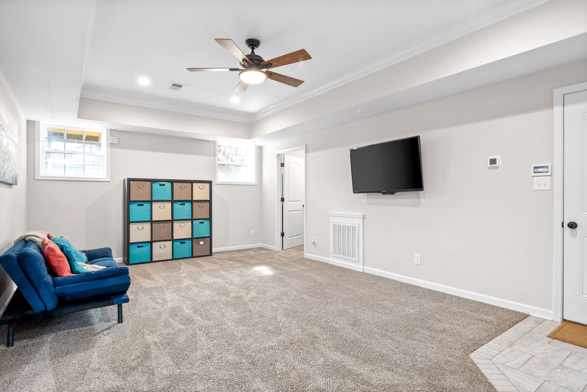 1478 Raven Road Clarksville, TN 37042 - Photo 29 of 42 a living room with furniture and a flat screen tv