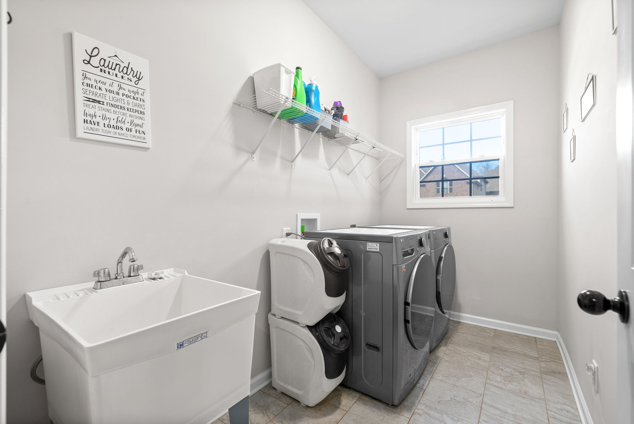 1478 Raven Road Clarksville, TN 37042 - Photo 32 of 42 a bathroom with a sink and a mirror