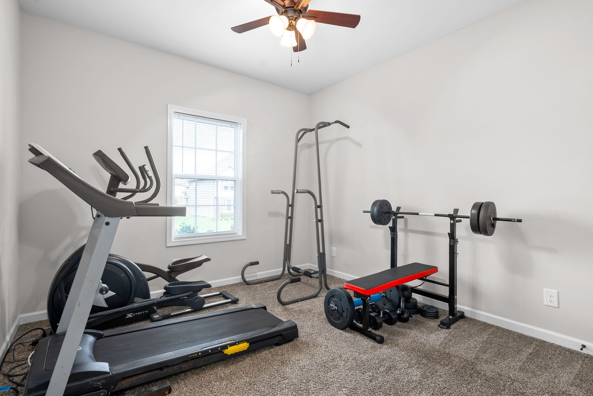 1478 Raven Road Clarksville, TN 37042 - Photo 36 of 42 a living room with furniture a air conditioner vent and a window