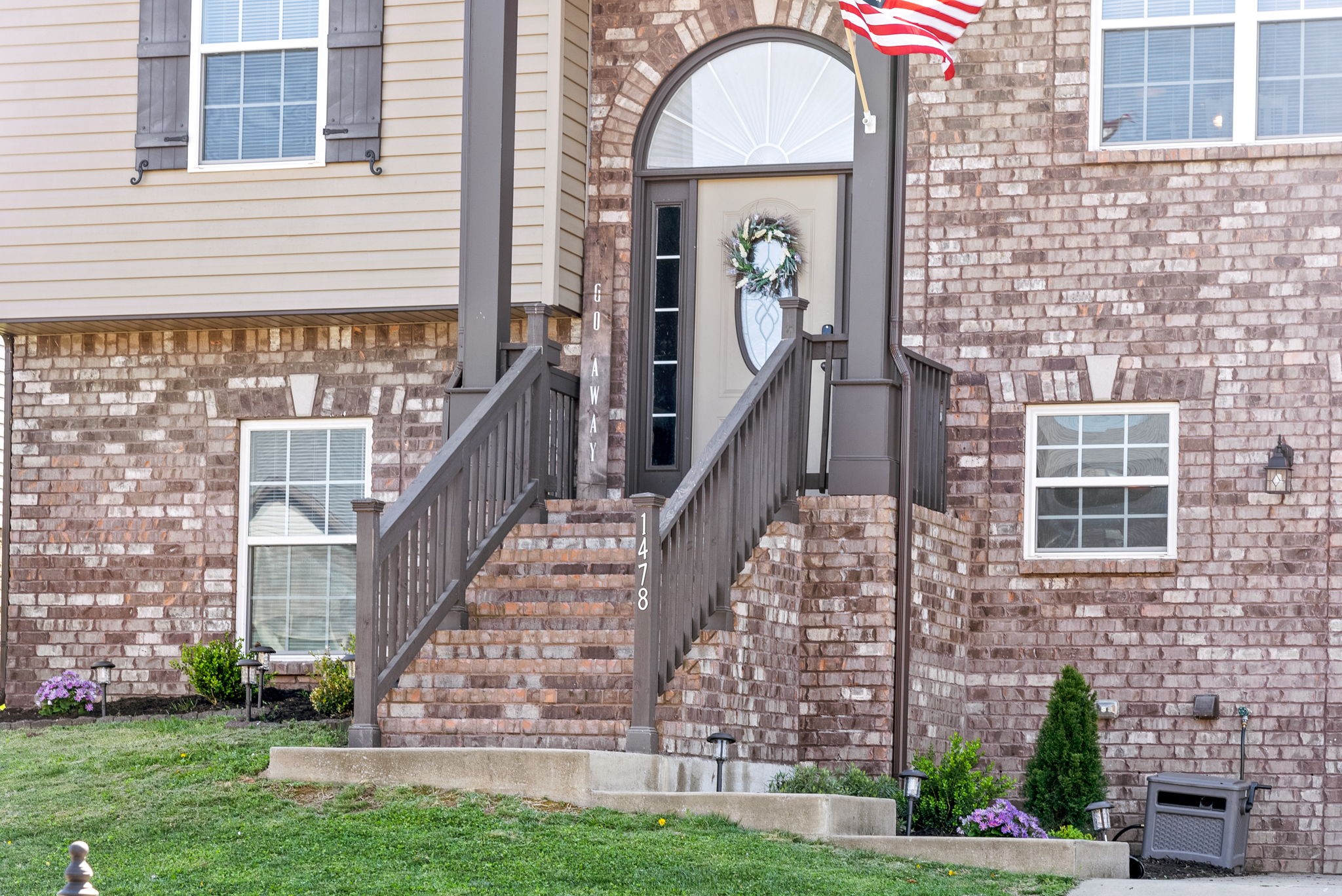 1478 Raven Road Clarksville, TN 37042 - Photo 4 of 42 a front view of a house with garden