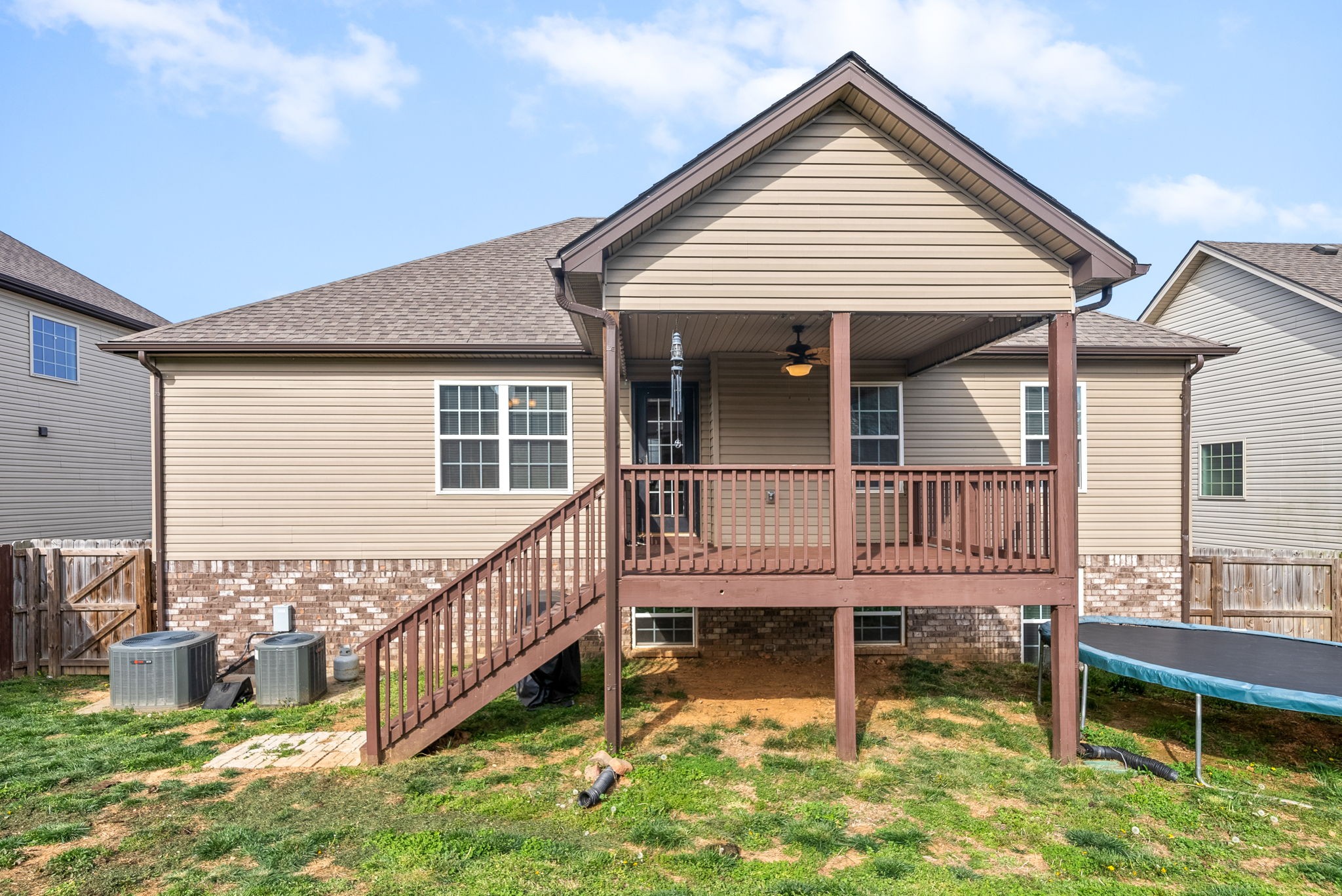 1478 Raven Road Clarksville, TN 37042 - Photo 41 of 42 a view of a house with a wooden deck and a yard