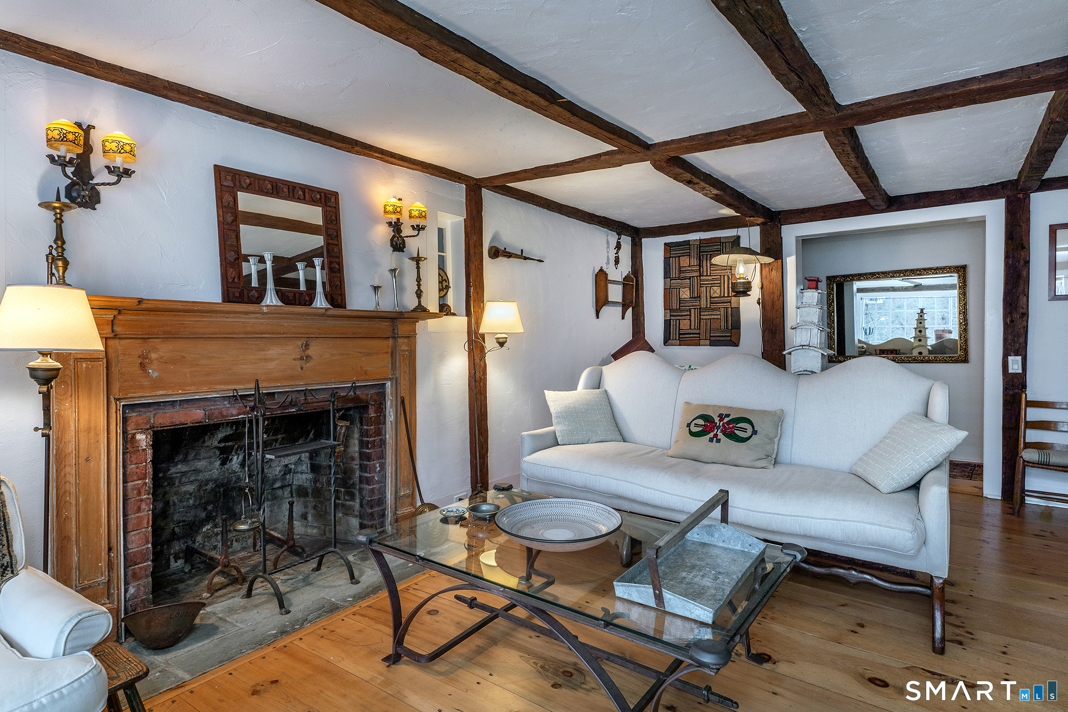 197 Skyline Ridge Road Bridgewater, CT 06752 - Photo 7 of 31 a living room with furniture and a fireplace
