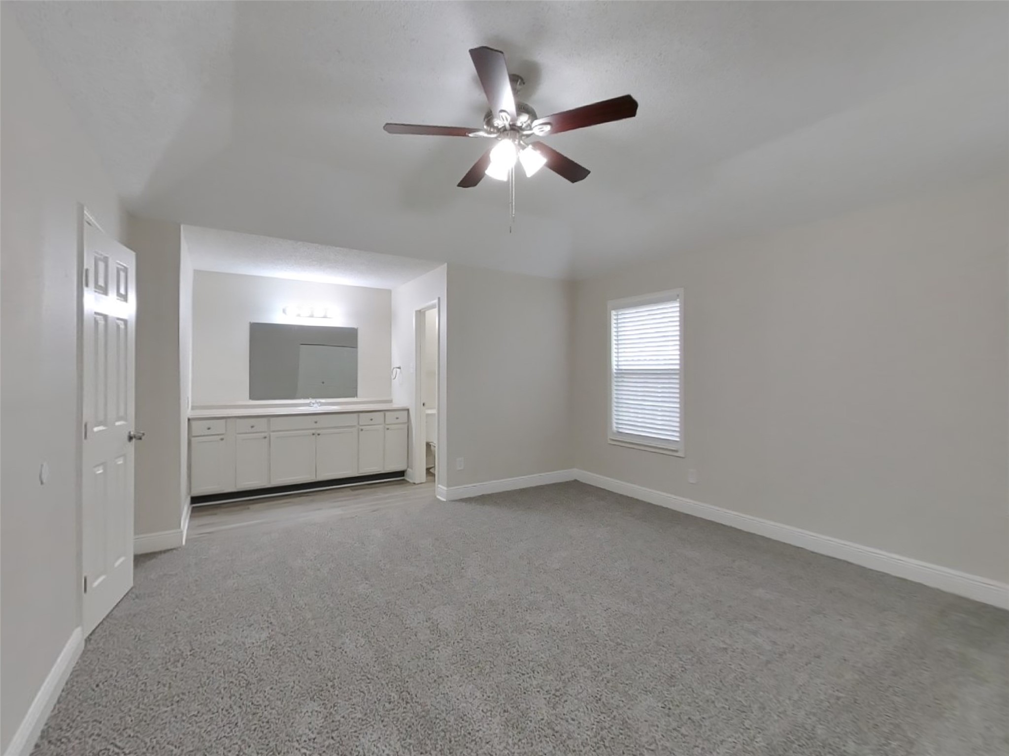 9607 Cleveland Bay Court Houston, TX 77065 - Photo 8 of 18 a view of an empty room with a window