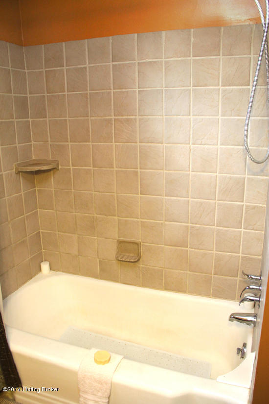 5409 Layne Road Louisville, KY 40219 - Photo 17 of 35 exquisite, stone-textured wall tile & mounted soap holders...